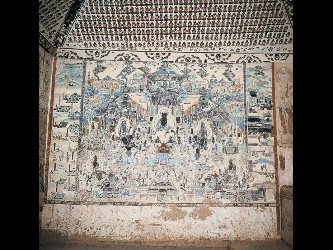Slide: painted Buddhist cosmology mural.