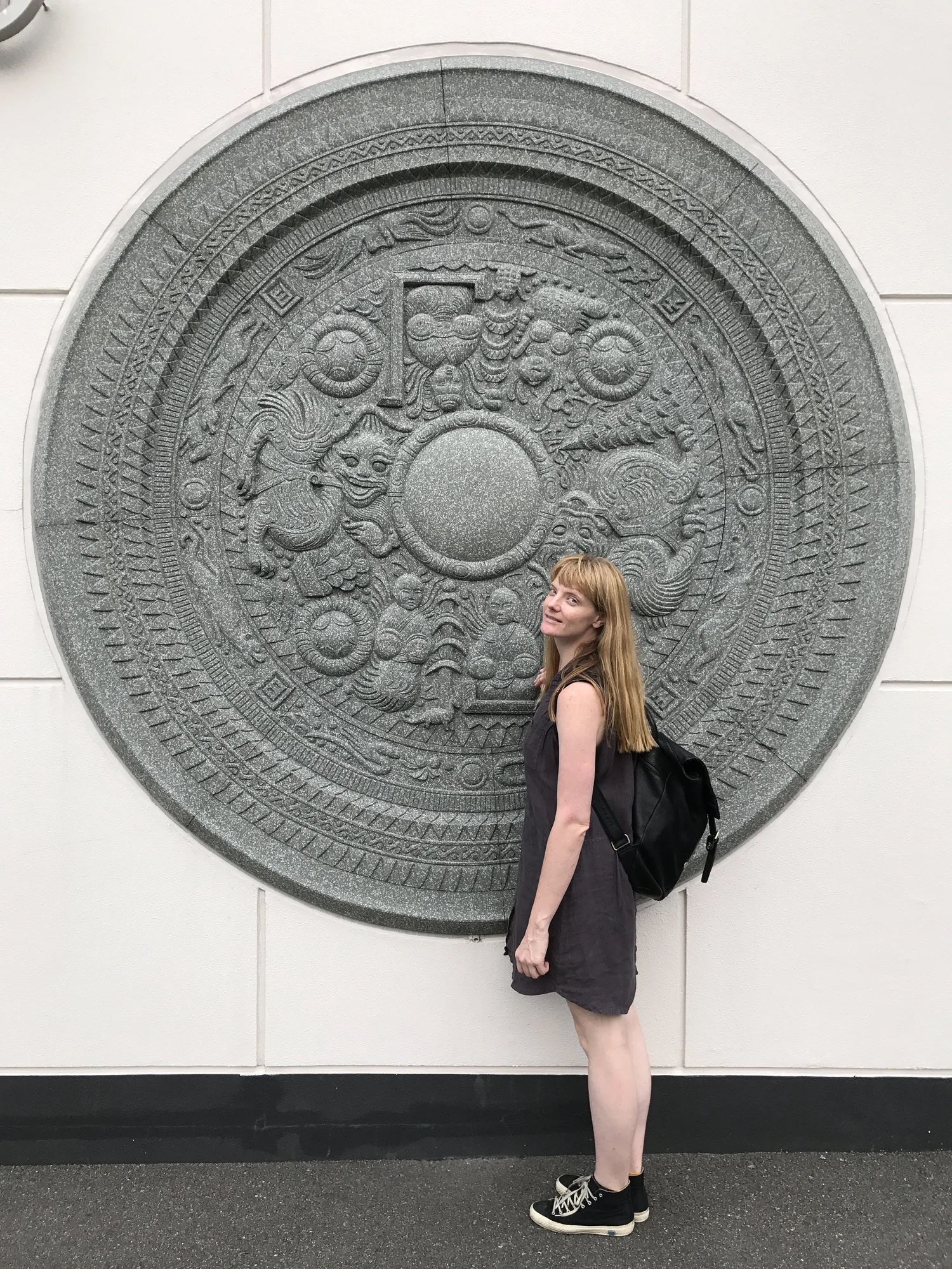 Reading a wall display together on a museum visit.