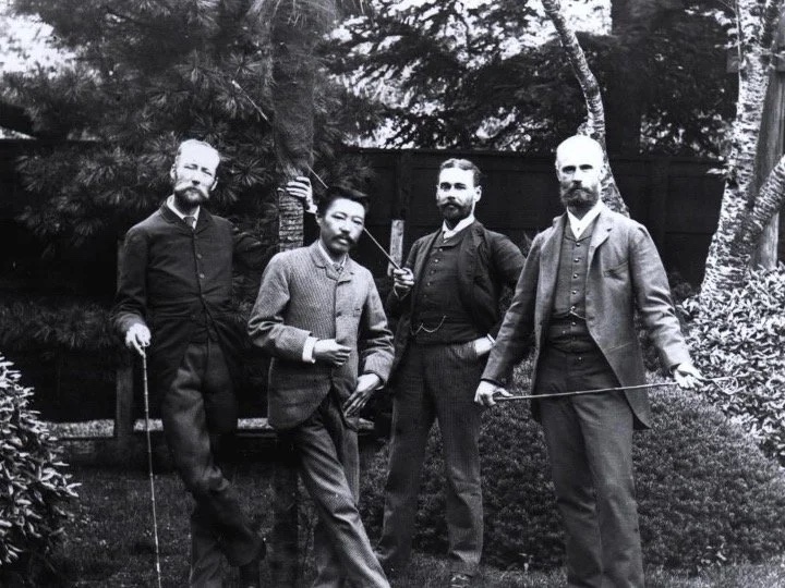 Slide: photograph of a Meiji-era survey team in a forest.