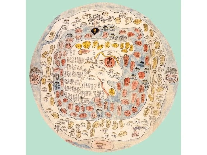 Slide: circular Jambudvīpa world map.
